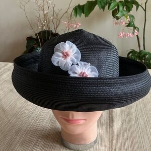 Elegant Black Hat with Pink Floral Accents